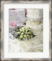 Framed Cake with rings and gifts on a sheet