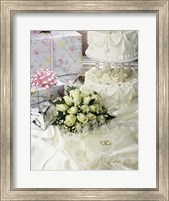 Framed Cake with rings and gifts on a sheet