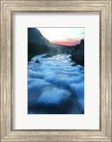 Framed River flowing around rocks at sunrise, Sunrift Gorge, US Glacier National Park, Montana, USA