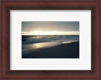 Framed Waves breaking on the beach at sunrise