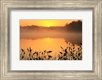 Framed Sunrise over a lake