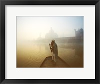 Framed Silhouette of a man standing on a boat in the Yamuna River, Taj Mahal, Agra, Uttar Pradesh, India