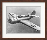 Framed High angle view of a fighter plane in flight, Curtiss SB2C Helldiver, December 1941