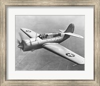 Framed High angle view of a fighter plane in flight, Curtiss SB2C Helldiver, December 1941