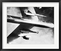 Framed Low angle view of a bomber plane carrying missiles during fight, AGM-28 Hound Dog, B-52 Stratofortress