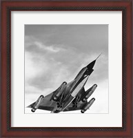 Framed Low angle view of a bomber plane in flight, B-58 hustler