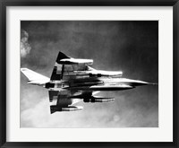 Framed Low angle view of a fighter plane in flight, B-58 Hustler