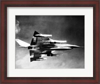 Framed Low angle view of a fighter plane in flight, B-58 Hustler