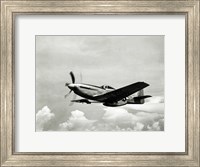 Framed Low angle view of a military airplane in flight, F-51 Mustang