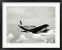 Framed Low angle view of a military airplane in flight, F-51 Mustang