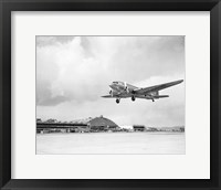 Framed Low angle view of a military airplane landing, Douglas DC-3