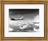Framed Side profile of a military tanker airplane refueling in flight, B-29 Superfortress, F-84 Thunderjet
