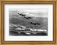 Framed High angle view of four fighter planes flying over an aircraft carrier, US Navy Banshees, USS Coral Sea (CV-43)