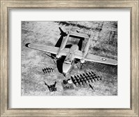Framed High angle view of soldiers standing near a military airplane, Fairchild C-119 Flying Boxcar