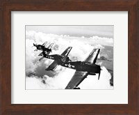 Framed High angle view of four fighter planes flying in formation, F6F Hellcat