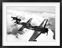 Framed High angle view of four fighter planes flying in formation, F6F Hellcat