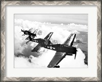 Framed High angle view of four fighter planes flying in formation, F6F Hellcat