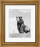 Framed Cowboy on top of escarpment