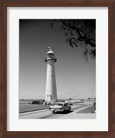 Framed USA, Mississippi, Biloxi, Biloxi Lighthouse with street in the foreground