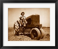 Framed Farmer Plowing a Field with a Tractor