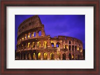 Framed Low angle view of a coliseum lit up at night, Colosseum, Rome, Italy