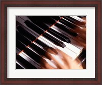 Framed Close-up of a person's hands playing a piano