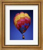 Framed Low angle view of a hot air balloon rising, Albuquerque International Balloon Fiesta, Albuquerque, New Mexico, USA