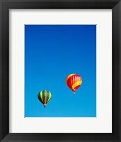 Framed Green and Red Hot Air Balloons Taking Off