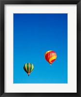 Framed Green and Red Hot Air Balloons Taking Off