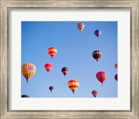 Framed Hot Air Balloons in a Faded Sky