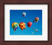 Framed Low angle view of a group of hot air balloons in the sky