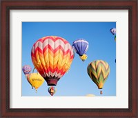 Framed Low angle view of hot air balloons in the sky