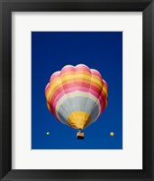 Framed Low Angle Shot of a Rainbow Hot Air Balloon