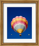 Framed Low Angle Shot of a Rainbow Hot Air Balloon