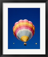 Framed Low Angle Shot of a Rainbow Hot Air Balloon