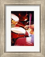 Framed Man playing the drums
