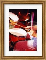 Framed Man playing the drums