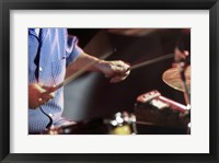 Framed Man playing the drums