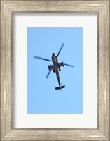 Framed Low angle view of a military helicopter in flight