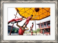 Framed Group of children performing acrobatics, Shanghai, China