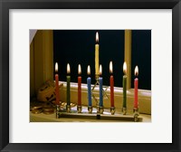 Framed Close-up of a menorah with burning candles and a Star of David