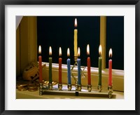 Framed Close-up of a menorah with burning candles and a Star of David