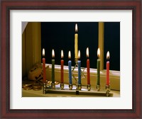 Framed Close-up of a menorah with burning candles and a Star of David