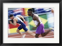 Framed Side profile of two young men running on a running track