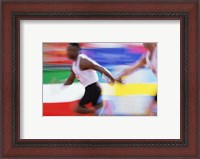 Framed Side profile of two young men passing a relay baton
