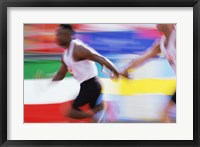 Framed Side profile of two young men passing a relay baton