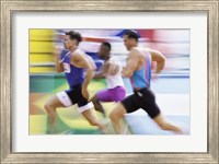 Framed Side profile of three men running on a track