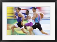 Framed Side profile of three men running on a track