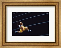 Framed High angle view of a young man running on a running track