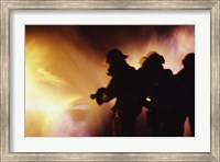 Framed Firefighters extinguishing a fire